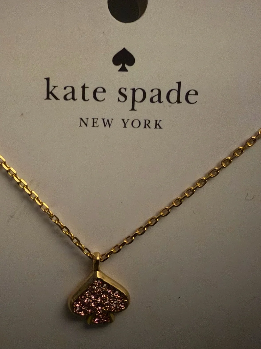 kate spade Gold Tone Necklace with Pink Sparkle Spade Pendant